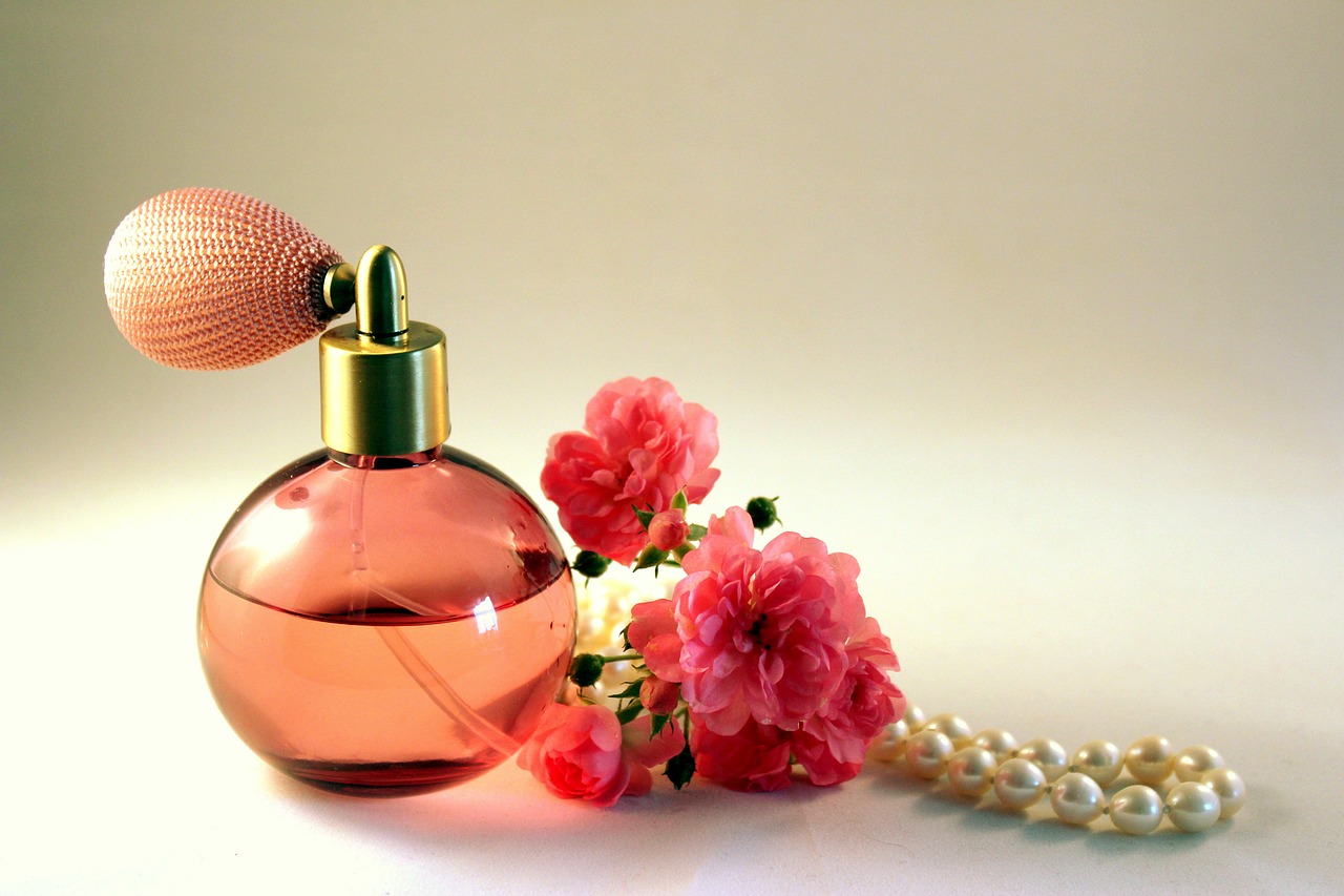 bottle,perfume,roses .jpg